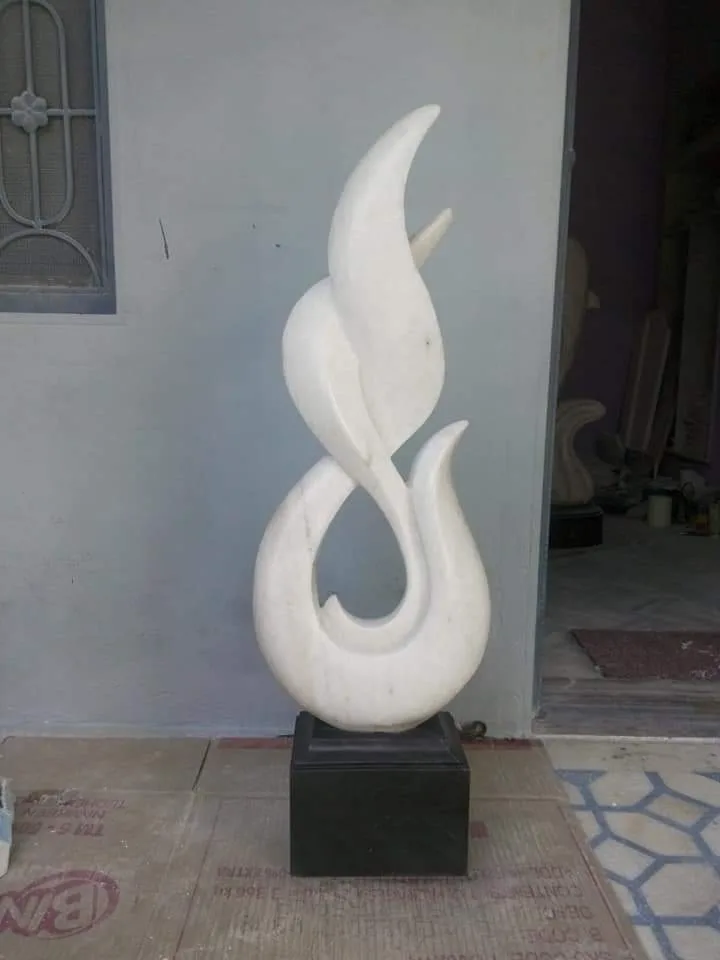 Fiamma Sculpture — Makrana White, Hand-carved finish