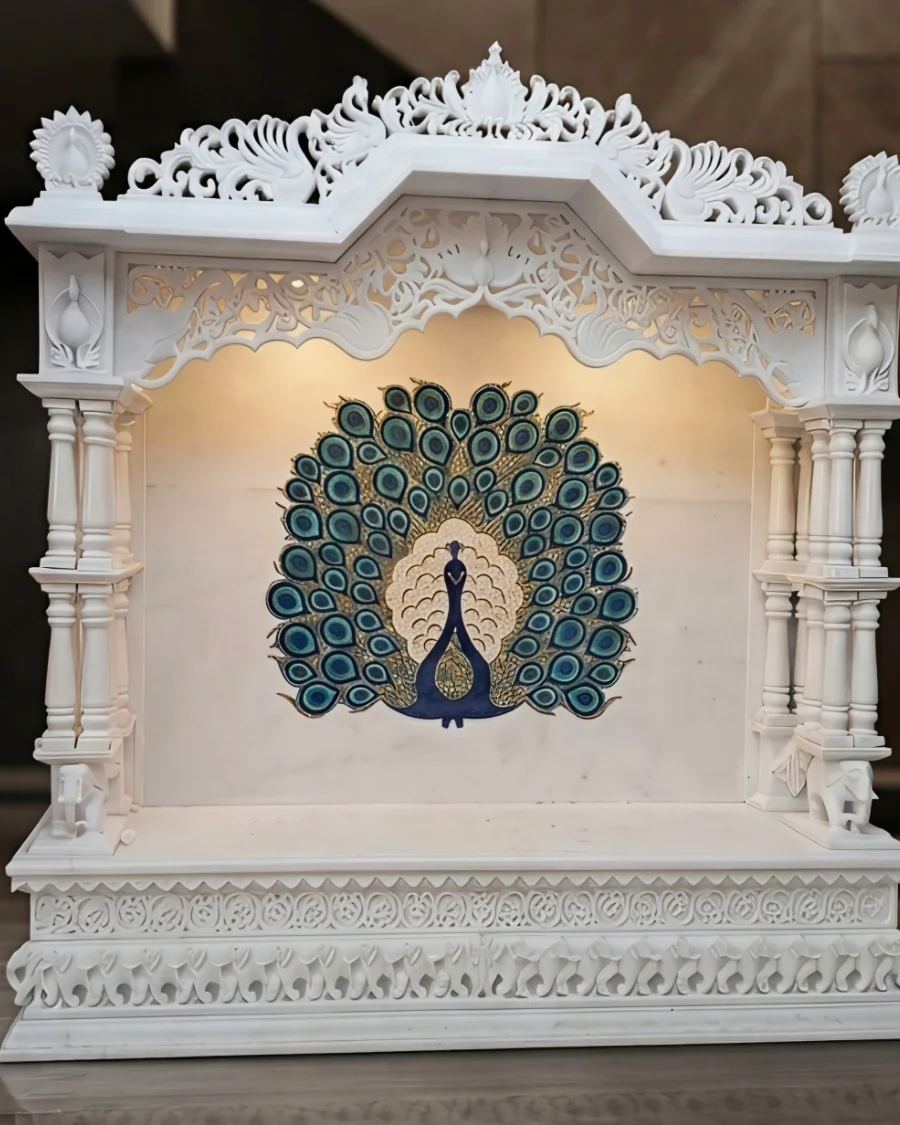 Peacock inlay mandir in Makrana white marble with turned pillars and a carved plinth