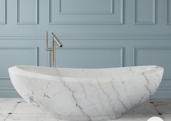 A freestanding Calacatta marble bath carved from a single block