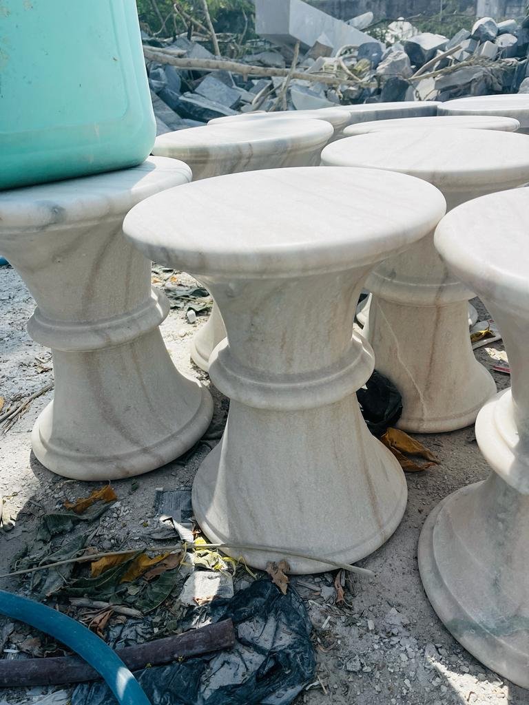 Turned marble garden stools