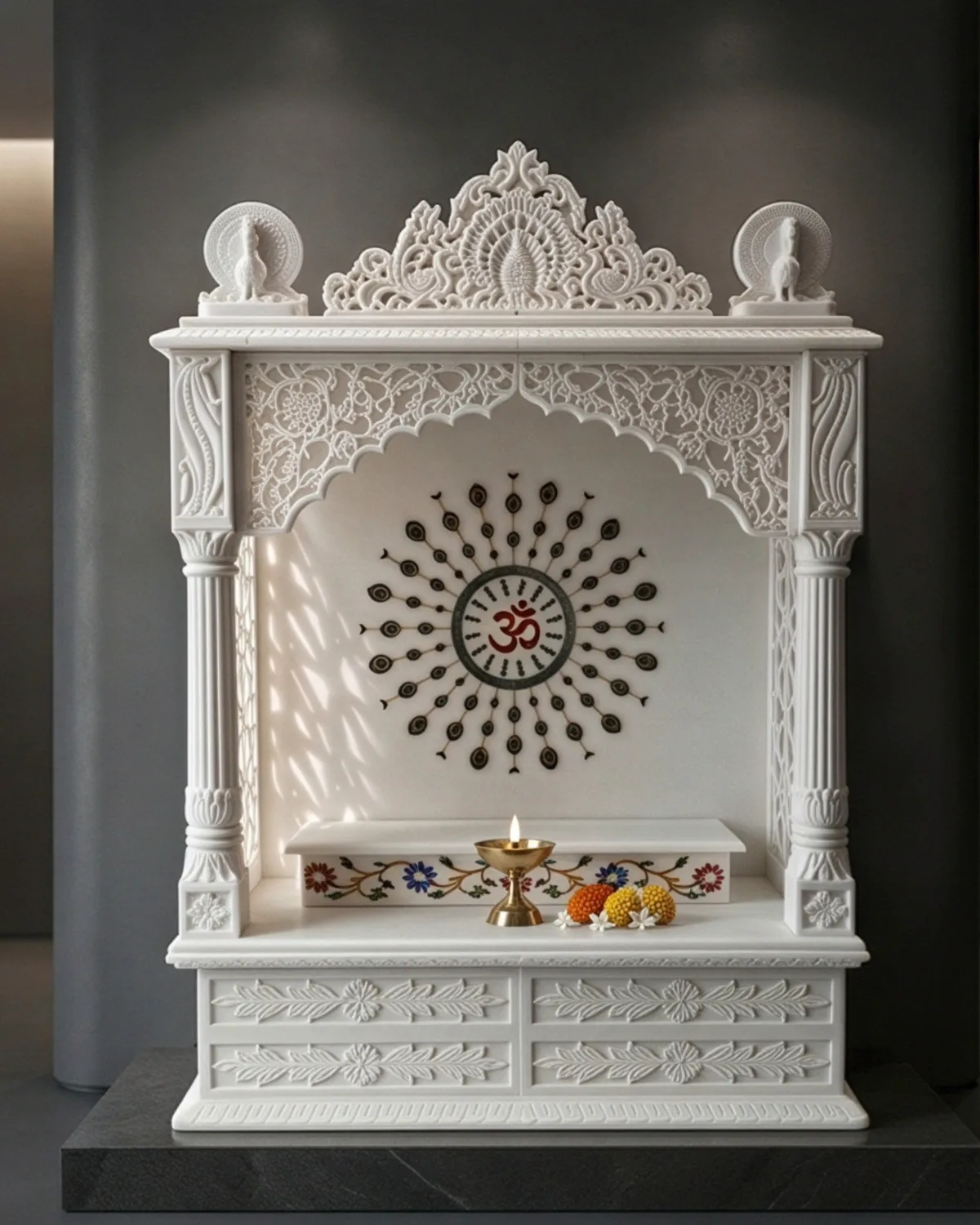 White marble Om mandir for home with a pierced Surya halo inlay, carved arch and floral inlay step