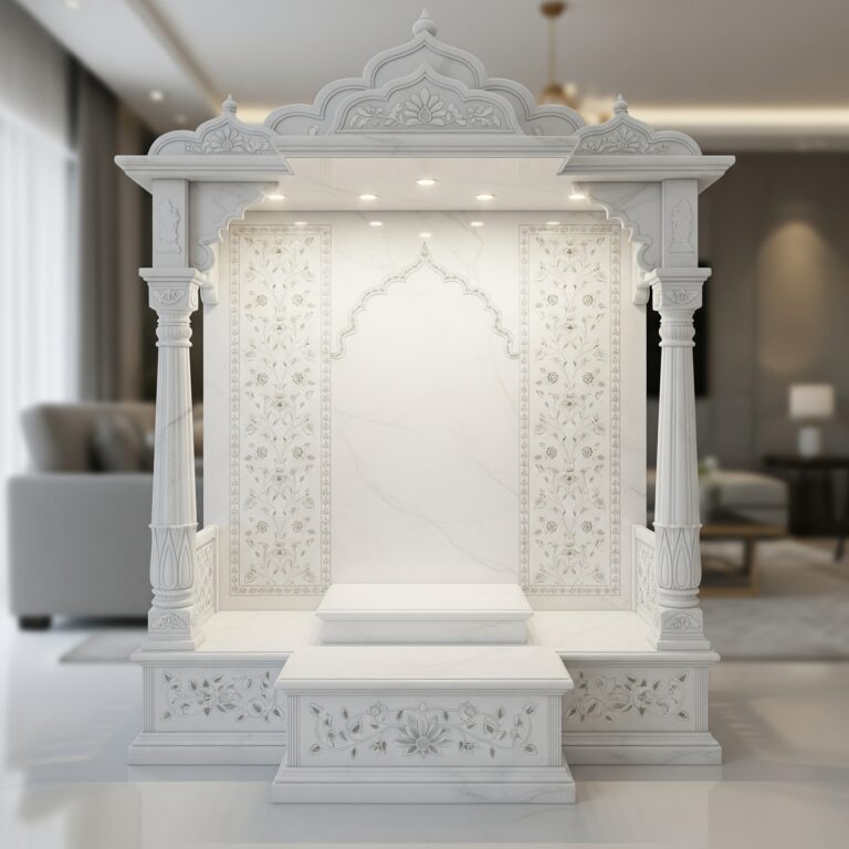 Hand-carved Makrana white marble temple for home mandir with intricate gold leaf work.